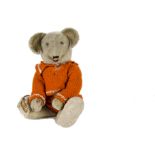 A rare 1930s Laughing Roosevelt-type Teddy Bear, possibly German, with beige wool plush, clear and