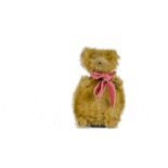 A rare Schuco atomizer perfume bottle Teddy Bear, 1930s, with golden mohair, black bead eyes,