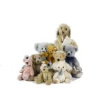 Nine Artist and Manufactured Teddy Bears: including a small white Merrythought Cheeky - 6in. (15cm.)