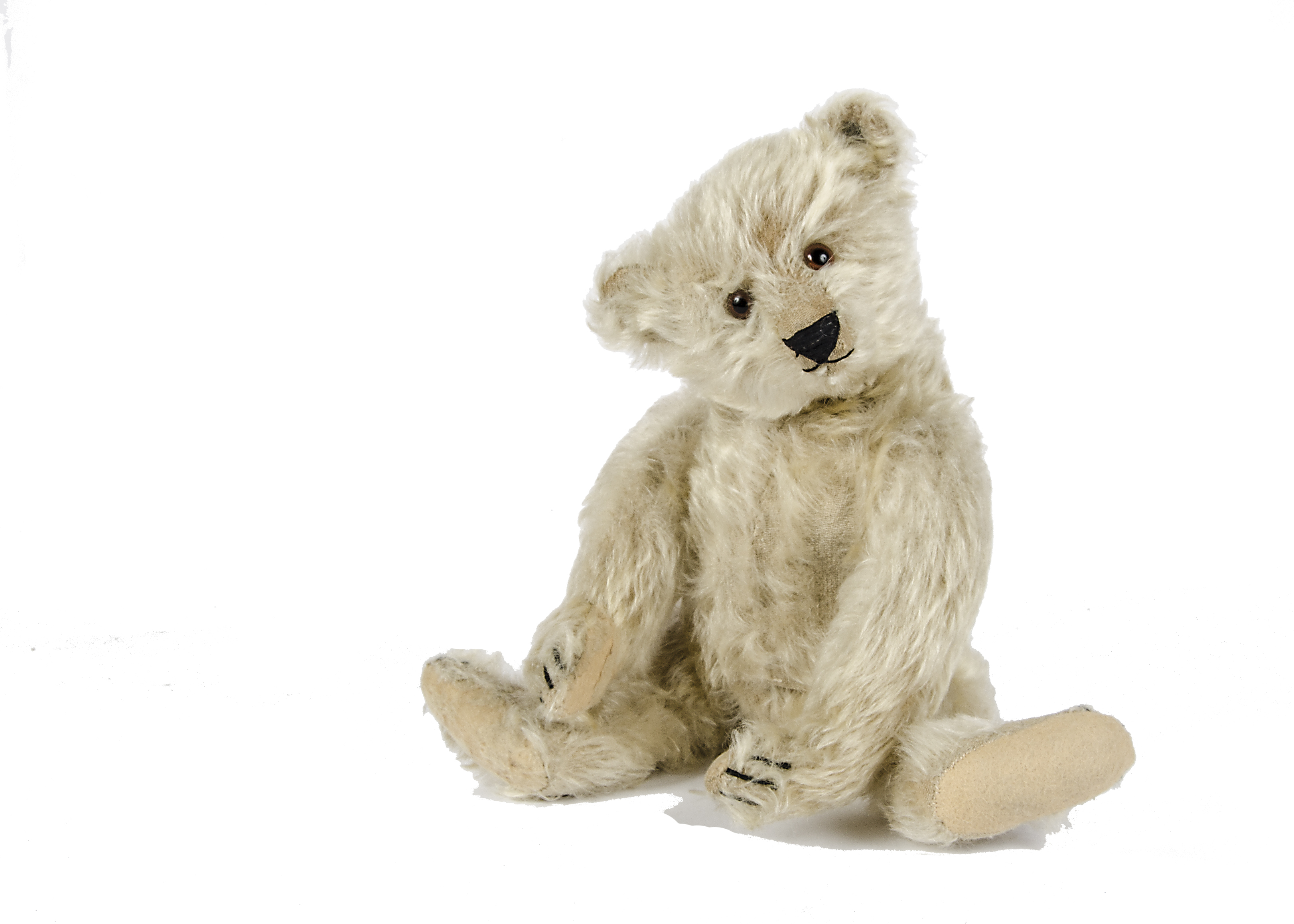 A rare Steiff Teddy Clown, circa 1926, with pale yellow mohair, brown and black glass eyes,