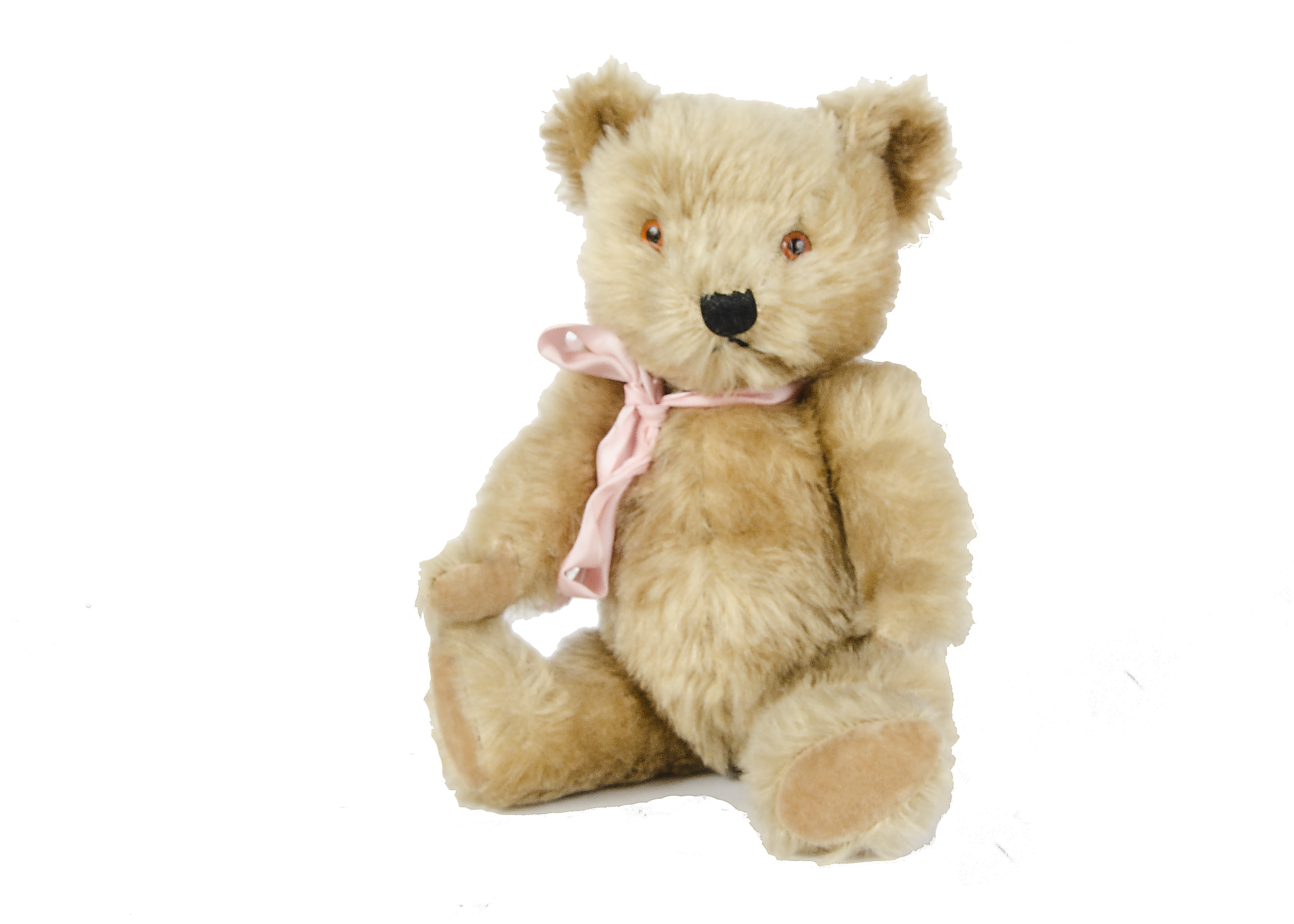 A small size Chiltern Hugmee Teddy Bear, 1950s, with golden mohair, orange and black plastic eyes,