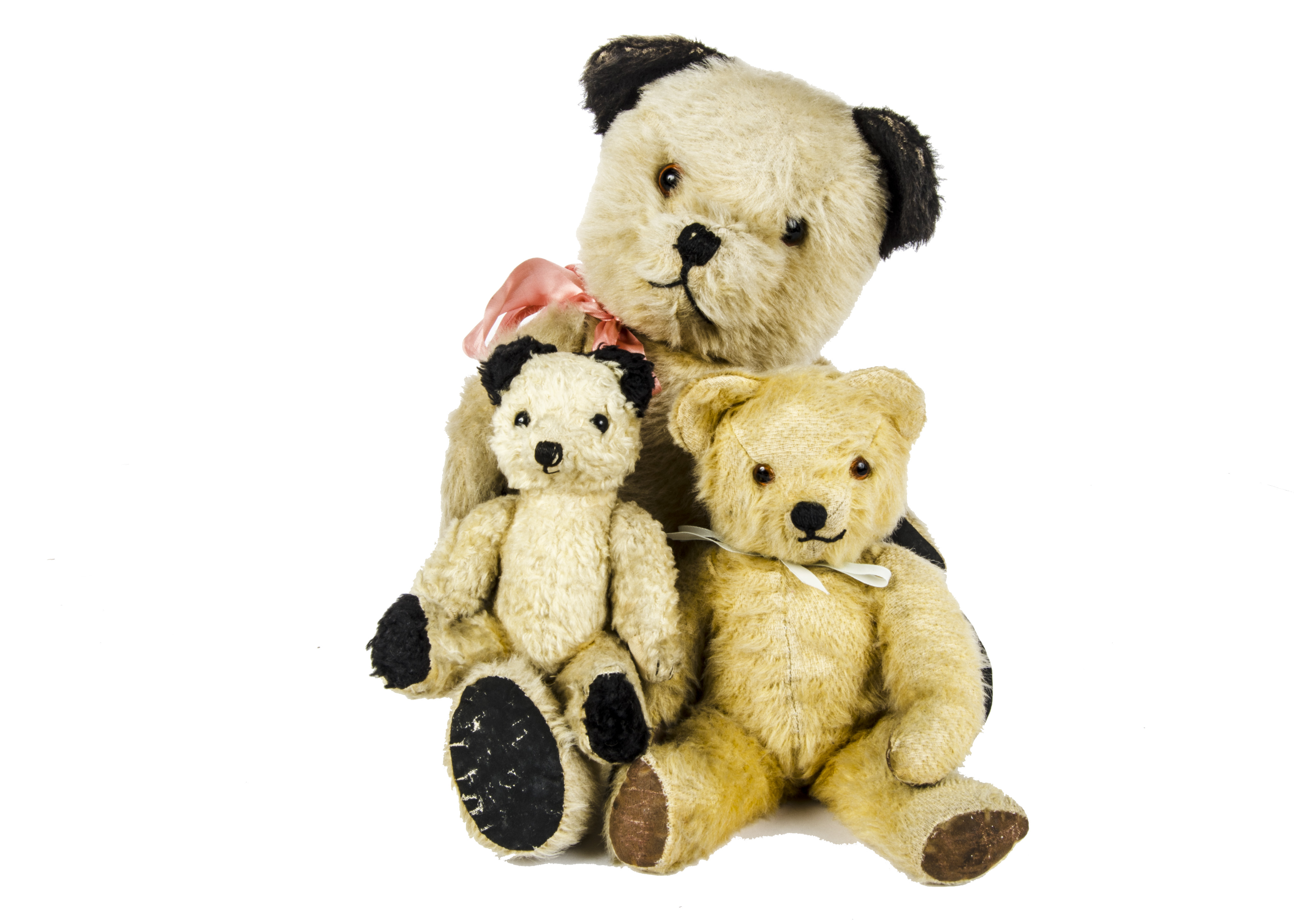 A British Sooty - type Teddy Bear, 1950s, with golden mohair, orange and black glass eyes, black