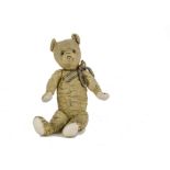 A Chiltern artificial silk plush Teddy Bear, the property of B. Taylor, 1930s, with yellow plush,