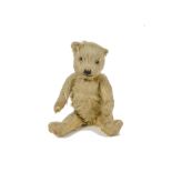 A small Chiltern - type Teddy Bear, 1930s, with golden mohair, clear and black glass eyes with