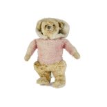 A rare large Chiltern Skater Teddy Bear, 1930s, with blonde artificial silk plush head, backs of