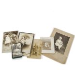 Six photographs featuring children with their Steiff Teddy Bears: including a boy and a girl sat