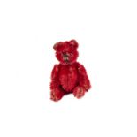 A rare Schuco red mohair Teddy Bear compact, 1930s, with black metal pin eyes, black stitched nose