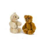 Two Schuco miniature Teddy Bears, 1950s, one cinnamon and one light golden mohair, both with metal