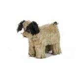 An Isa dog with spring legs, 1920s, with white and black mohair, clear and black glass eyes, black