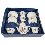 An Ellar (English) pottery child’s tea set, 1950s, two cups, saucers and side plates, teapot,