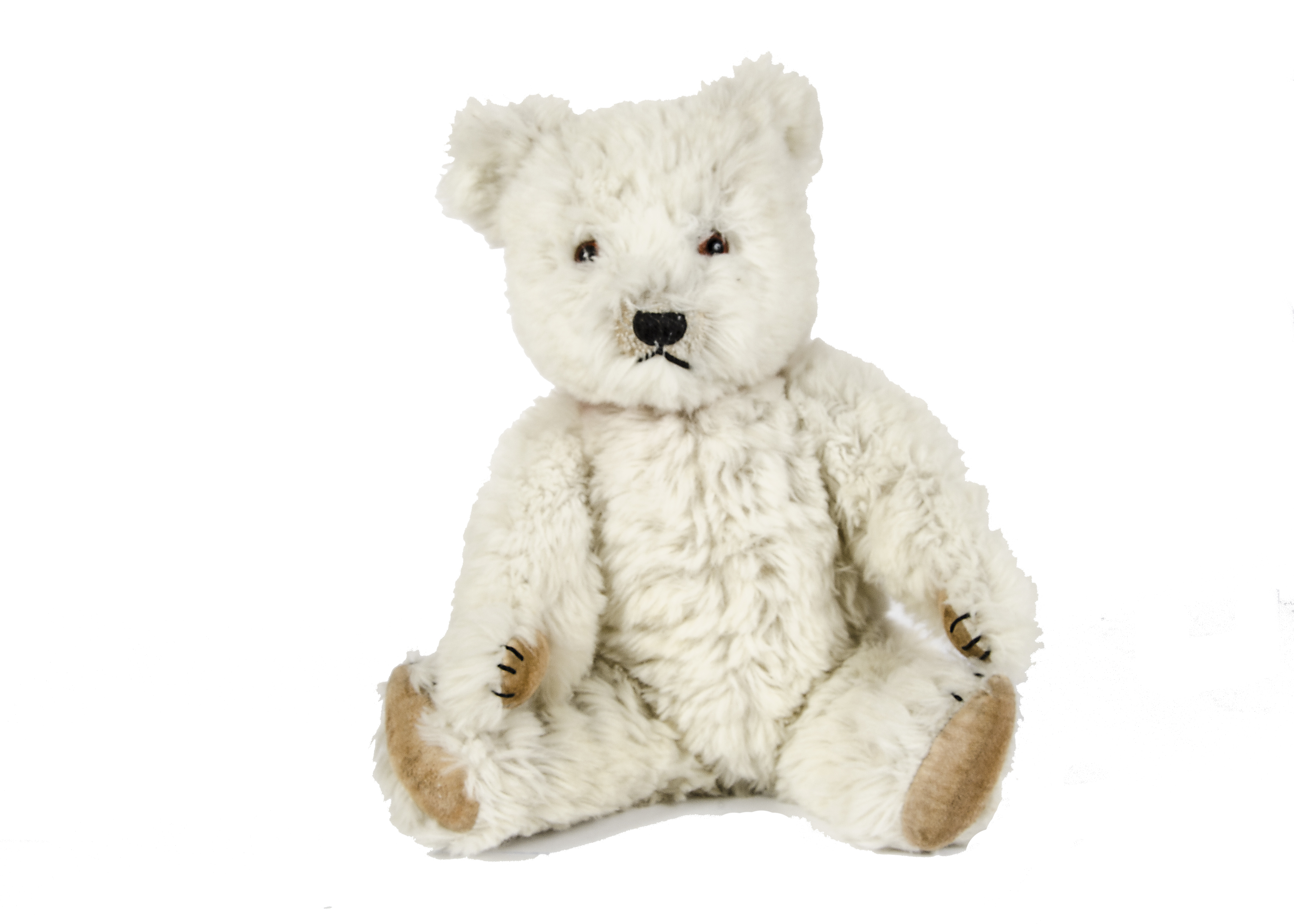 A Chiltern Hugmee Teddy Bear, 1950s, with white synthetic wool plush, orange and black glass eyes,