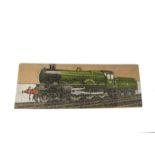 A Chad Valley GWR shaped Jigsaw ‘Caerphilly Castle’, showing a three quarter view of the Locomotive,