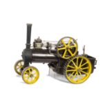 A 1½” scale coal-fired Live Steam single-cylinder traction engine: painted in deep maroon and