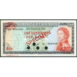 (†) East Caribbean Currency Authority, specimen $100, ND (1965), serial number A/1 0000000,