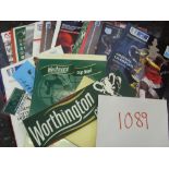 A collection of 18 autographed, big match programmes as played by Tottenham or Arsenal, all are