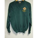 NORTHERN IRELAND A dark green long sleeve 40" acrylic jumper with the Northern Ireland crest on