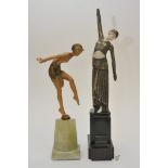 A pair of reproduction Art Deco figures,