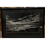 A framed black and white framed etched t