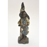 A cold painted spelter figure of an Indi