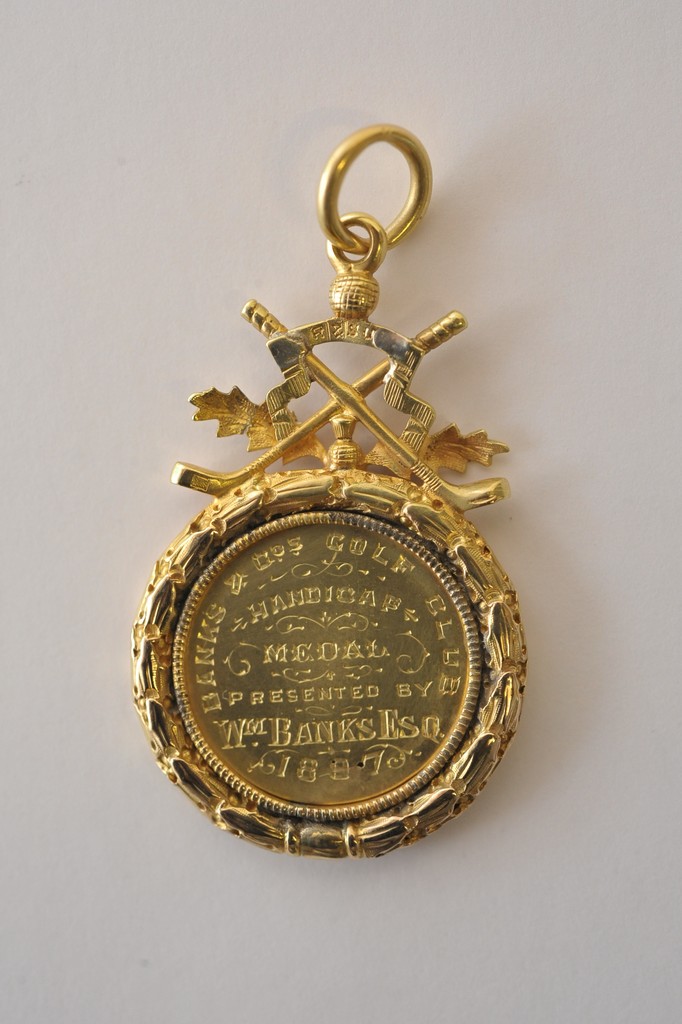 A Victorian gold golfing medal from Bank