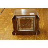 An inlaid walnut Art Deco mantel clock w