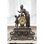 A French black marble and spelter clock