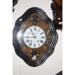 A continental wall clock with mother of