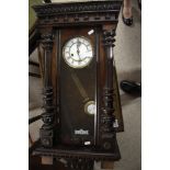 A mahogany cased Vienna type wall clock