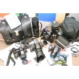 A bag of variious cameras including a Pr