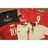 A collection of Football shirts includin