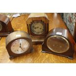 Three wood cased mantel clocks