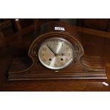 An Edwardian inlaid mahogany mantel cloc