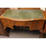 A burr walnut writing desk with green le