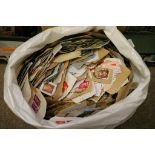 A large bag of various stamps