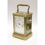 A brass cased carriage clock in original