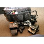 A camera bag containing various photogra