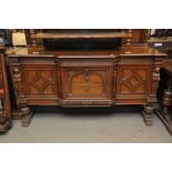 A large and fine quality oak sideboard b