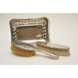 A pair of silver hairbrushes hallmarked