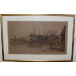 A large gilt framed etching depicting a