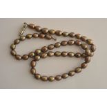 A brown cultured pearl necklace