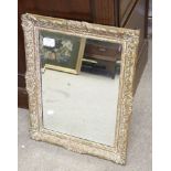 A small gilt framed wall mirror with bev