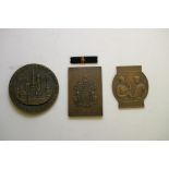 A collection of three cased bronze medal