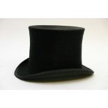 An old top hat with silk lining