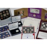 A collection of nine boxed proof coin se