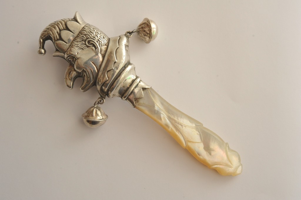 A novelty silver child's rattle in the f