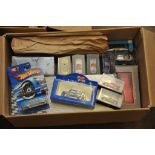 A box of toy cars including matchbox