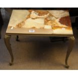 A sectional onyx top occasional table