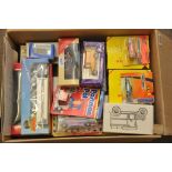 A box of toy cars including matchbox