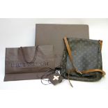 A boxed Louis Vuitton handbag (musette s