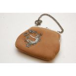 A brown cloth purse with applied Art Nou